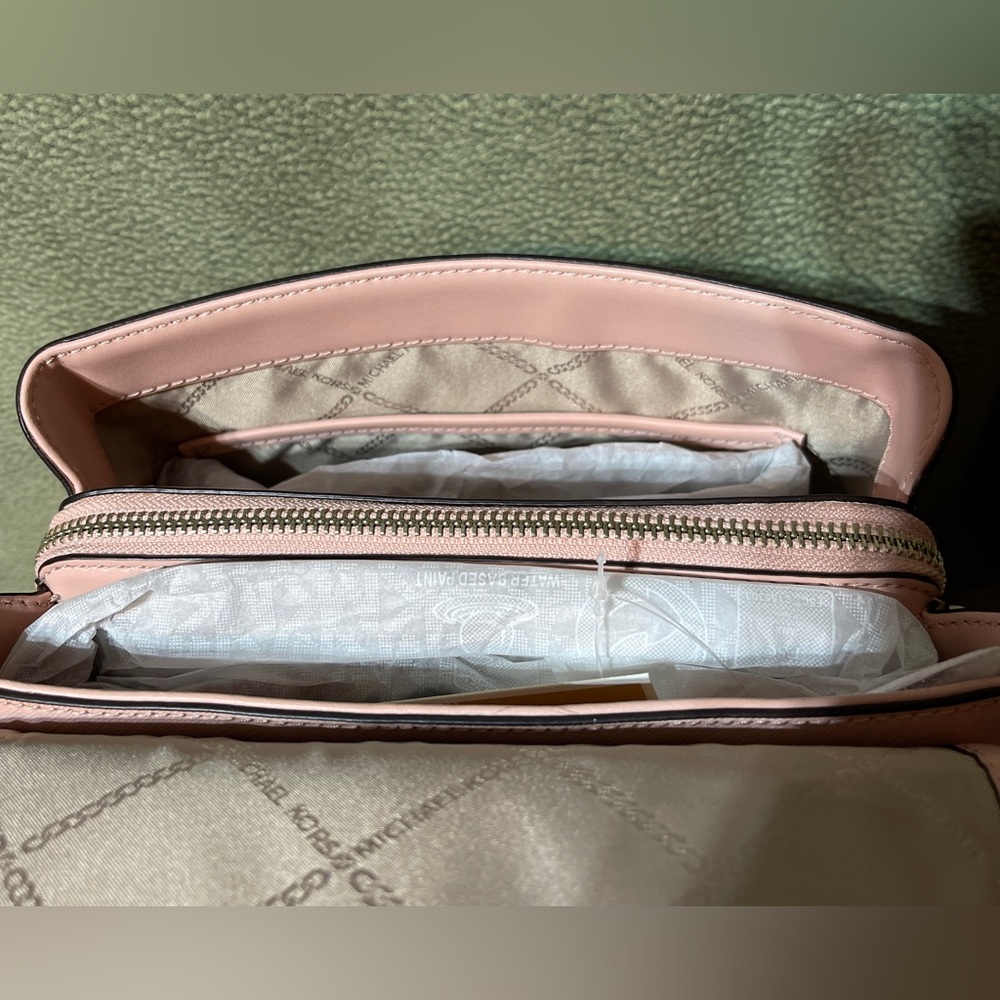 MK stylish pink leather backpack